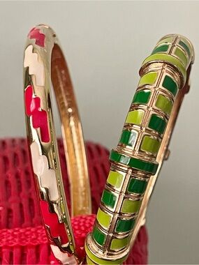 Gold tone enamel hinged bangles. Excellent condition